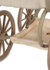 Beige vintage-style Konges Sloejd Mini Doll Pram with large spoked wheels and a quilted basket beneath, adorned with a subtle floral pattern. The stroller frame and wheels are crafted from matching beige material, echoing the charm of a classic doll pram.