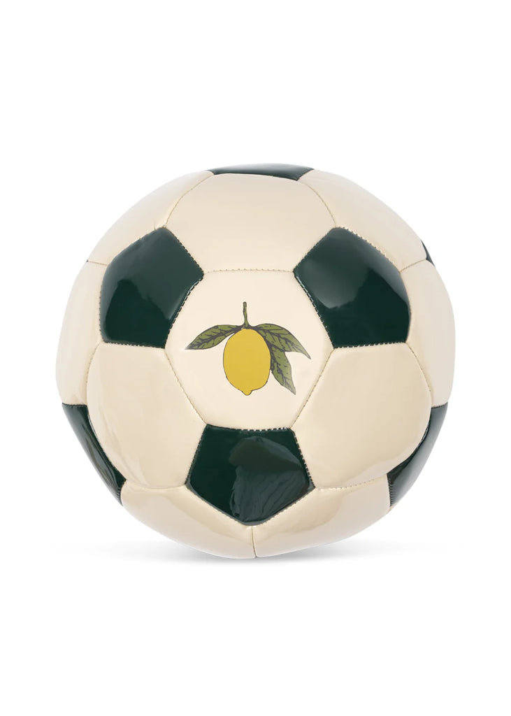 Introducing the Konges Sloejd Football Set: a cream and dark green soccer ball featuring a charming yellow lemon with green leaves illustration on one of its panels. Perfect for backyard practice or adding a whimsical touch to your football activity set, this playful design captures the signature style of Konges Sløjd football accessories.