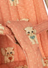 Close-up of the Konges Sloejd Doll Stroller - Ciao Miao Rose, showcasing pink quilted fabric adorned with small white polka dots and charming illustrated kittens holding hearts.