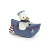 The Mon Ami - Sailor Duck features an adorable Sailor Duck Plush dressed in a sailor hat and scarf, sitting inside a blue plush boat decorated with an anchor symbol and a red-striped paddle—making this the perfect nautical-themed plush play set for any stuffed animal collection.