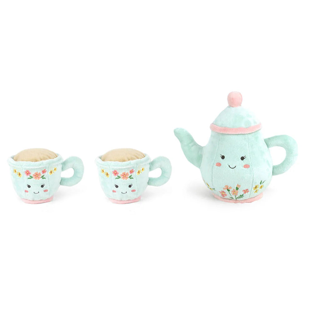 The Mon Ami - Afternoon Tea Set Plush Toy features a light blue teapot and two teacups, each decorated with delightful flowers and cheerful faces, all arranged on a white background—perfect cuddly tea party toys for imaginative pretend play.
