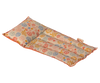 The Maileg Beach Float, Mouse - Flower is a rectangular heating pad adorned with a floral pattern, primarily featuring red, yellow, and blue flowers on a light background. This pad is segmented into three columns and made from durable raft-like fabric to ensure longevity. It also features a label on one edge.