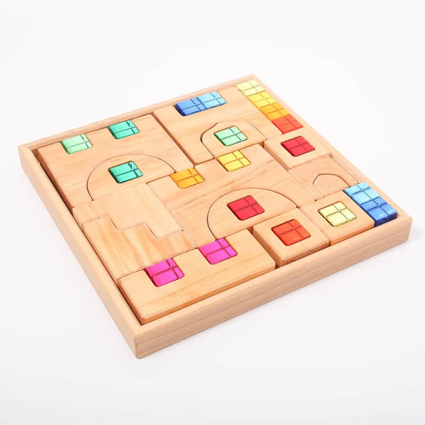 The Bauspiel Lucent Castle (34 pieces) is a wooden puzzle set in a square frame, featuring vibrant building blocks with transparent sections in blue, red, yellow, and green—perfect for enhancing any wooden toy or construction set collection.