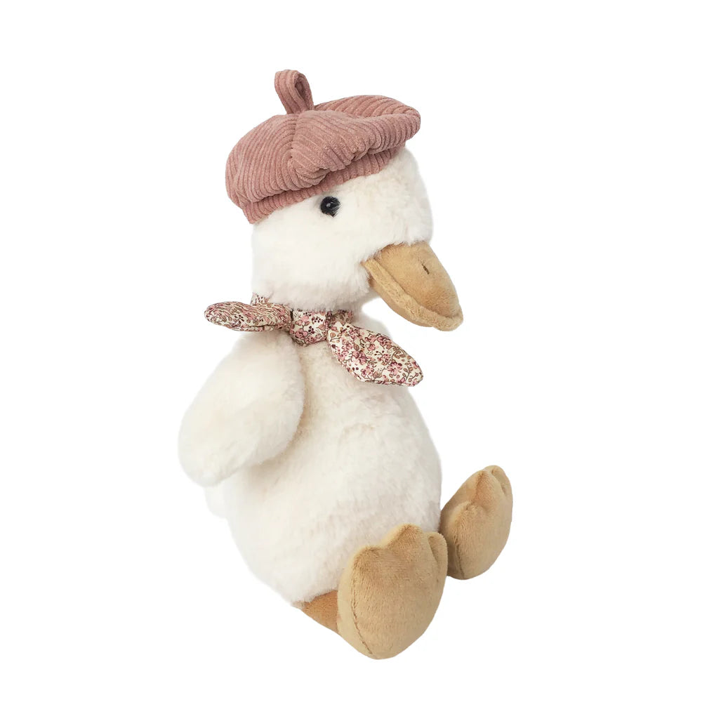 Mon Ami - Colette the Duck Plush Toy features a white body, beige beak and feet, pink corduroy beret, and floral scarf. Sitting upright against a white background, it's a charming snuggle gift for all ages.