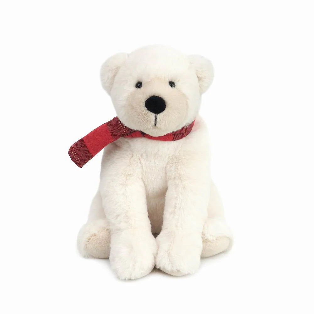 The Mon Ami North Polar Bear Plush Toy sits upright, featuring a cozy red and black plaid scarf around its neck, all set against a plain white background.