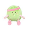 The Mon Ami Tina Tennis Ball Plush Toy is a green, smiling tennis ball plush with pink and white striped arms and legs, a pink headband, and is perfect for kids.