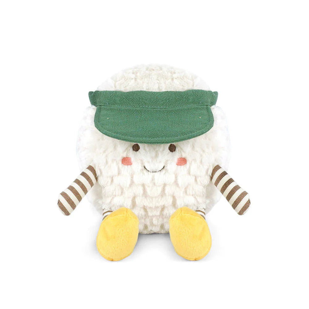 The Mon Ami TeeTee Golf Ball Plush Toy features a round, fluffy white body, yellow feet, striped brown arms, rosy cheeks, a cute smile, and a green visor—an adorable golf gift for kids.
