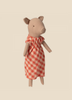 A Maileg Pig In A Dress, centered against a plain light beige background. The adorable pig has a simplistic design with visible stitching and a gentle expression.