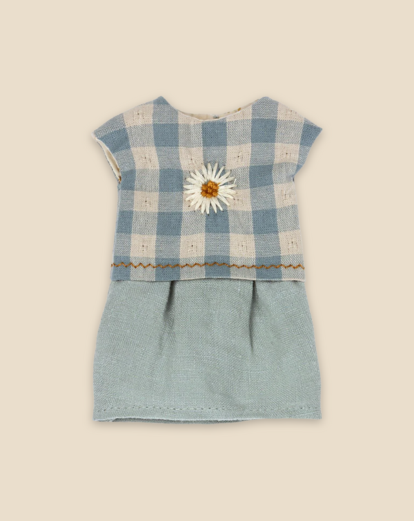 A cute Maileg Extra Clothing: Dress for Teddy Mum with a blue and white checkered top featuring a small white flower decoration, and a solid light blue lower section. The dress has short sleeves and is displayed on a plain beige background—the perfect outfit that can be paired with accessories you can purchase separately.