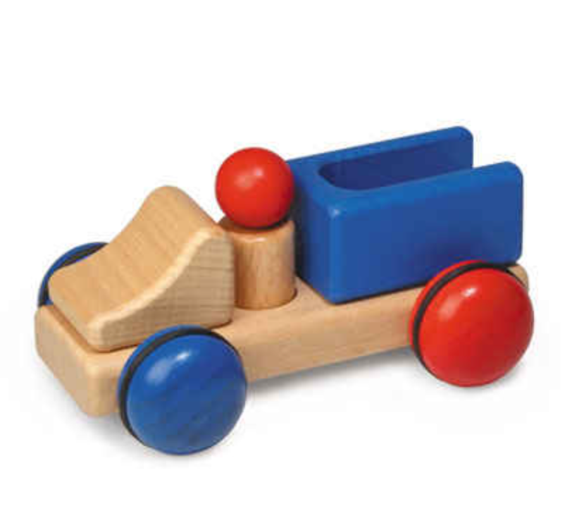 A Fagus Wooden Truck - Mini Series crafted from wood, featuring a natural finish, with a blue cargo bed, red wheels, and round red knobs on its sides, set against a white background.