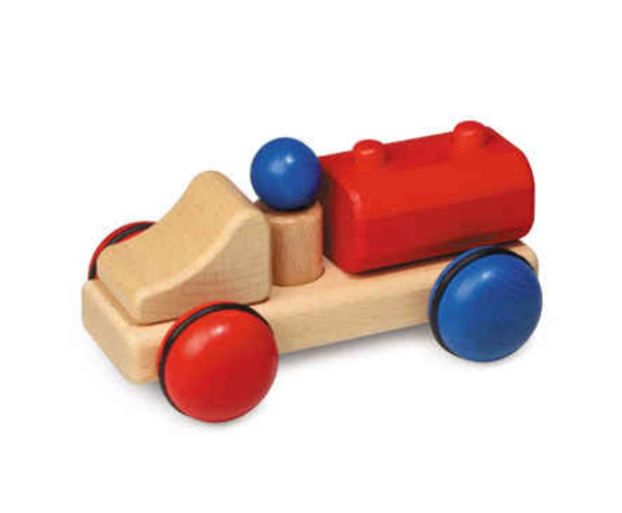 A handcrafted Fagus Wooden Tanker Truck - Mini Series with a natural finish, featuring red and blue accents on the wheels and body, isolated on a white background.