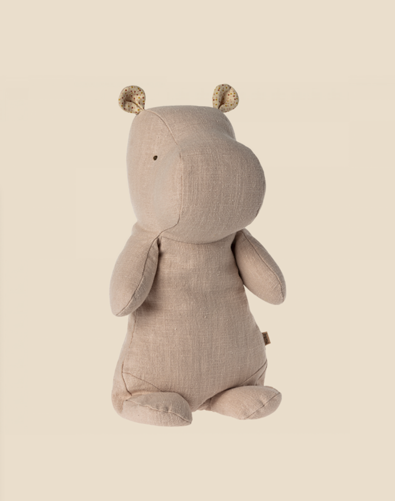 A beige, stuffed toy hippopotamus with small, round ears featuring a dotted pattern. Made from the softest recycled polyester, the toy stands upright against a light beige background. This minimalist design is perfect for Safari friends and plush enthusiasts alike.

Maileg Medium Hippo Stuffed Animal - Light Rose