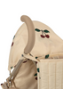 Close-up of a beige Konges Sloejd Zoe Doll Stroller - Cherry handle with a cushioned covering, attached to a foldable shade and side panel. The fabric features a pattern of red cherries with green leaves.