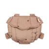 The Konges Sloejd Doll Carrier - Cherry Blush features a soft, light pink design with red cherry prints, elastic leg openings, a fold-over flap, and two fabric loops—ideal for pairing with your child's favorite dolls.