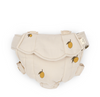 The Konges Sloejd Doll Carrier - Lemon features quilted, cream-colored cotton with a lemon pattern and adjustable straps, shown against a white background.