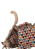A close-up of the Konges Sloejd Doll Stroller - Heart Kisses shows its beige handle and fabric with a red, blue, and brown heart pattern on a light background. Double wheels offer extra stability to this charming stroller.