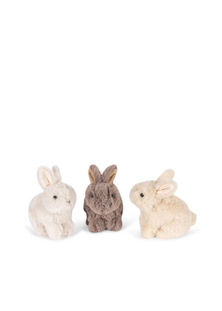 The Konges Sloejd Bunnys in Basket Set features three plush toy bunnies in white, brown, and beige, seated side by side. These adorable soft bunnies bring a charming accent to any room.