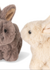 The Konges Sloejd Bunnys in Basket Set features two plush toy rabbits, one gray and one cream-colored, facing each other like soft little bunnies against a white background.