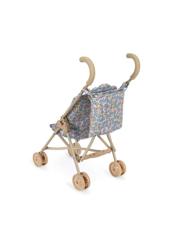 The Konges Sloejd Doll Stroller - Rose Flower features a beige frame, curved handles, floral-patterned seat, and four sets of double wheels, shown on a white background.