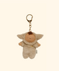 The Olli Ella Cozy Bag Charm - Lamby Pip is a plush bag accessory featuring a small, tan Cozy Dinkum doll with closed eyes and floppy ears dressed in a furry lamb costume, shown against a plain beige background.