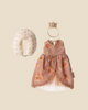 The Maileg Mum Mouse in Queen Dress with Stand features a pink floral dress, matching fabric crown, and white neck pillow with pink dots—perfect accessories for your Mum mouse—shown against a beige background.