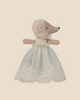 The Pre-order: Maileg Baby Mouse in Gown - Mint (arriving 06/15/26) stands upright in a charming mint dress and bonnet against a beige background, perfect for fans of adorable baby mouse accessories.