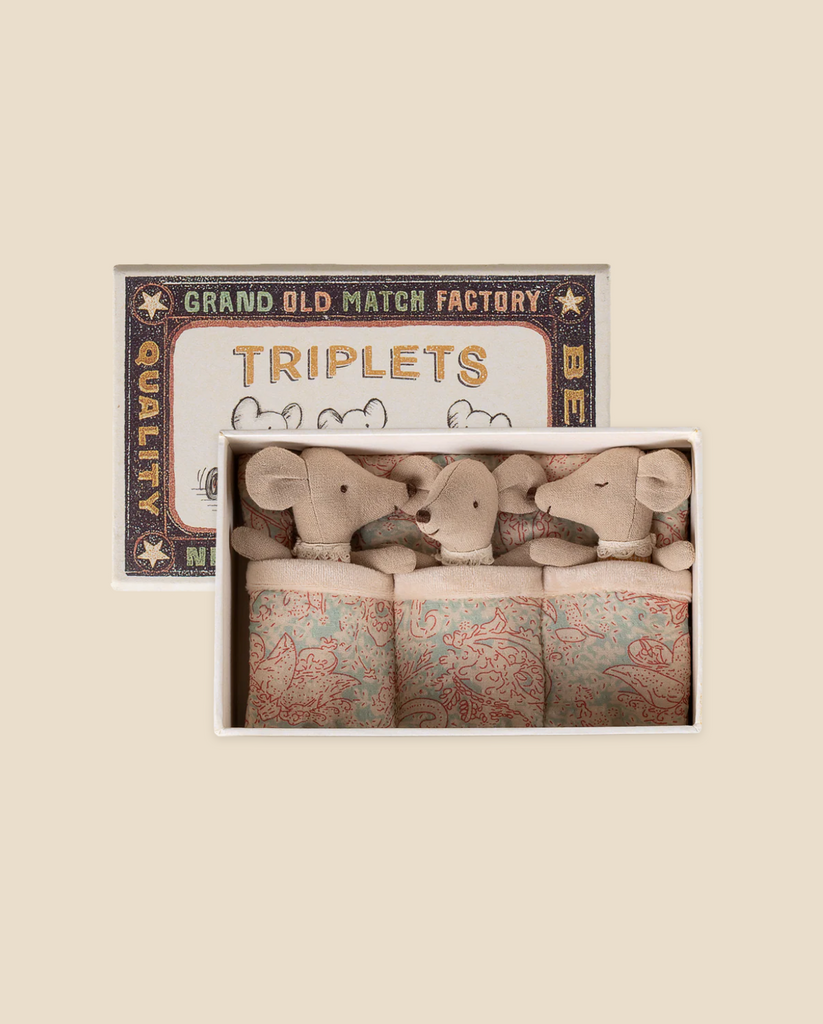 The Pre-order: Maileg Triplets, Baby Mice in Matchbox - Checker (expected 06/01/26) includes three baby mice, each wrapped in a patterned blanket, nestled side by side in a cozy matchbox bed.