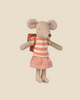 The Pre-order: Maileg Tricycle Mouse, Big Sister - Coral (arriving by 05/01/26) wears a pink and cream striped top, pink plaid skirt, and red school backpack, posed against a plain beige background.