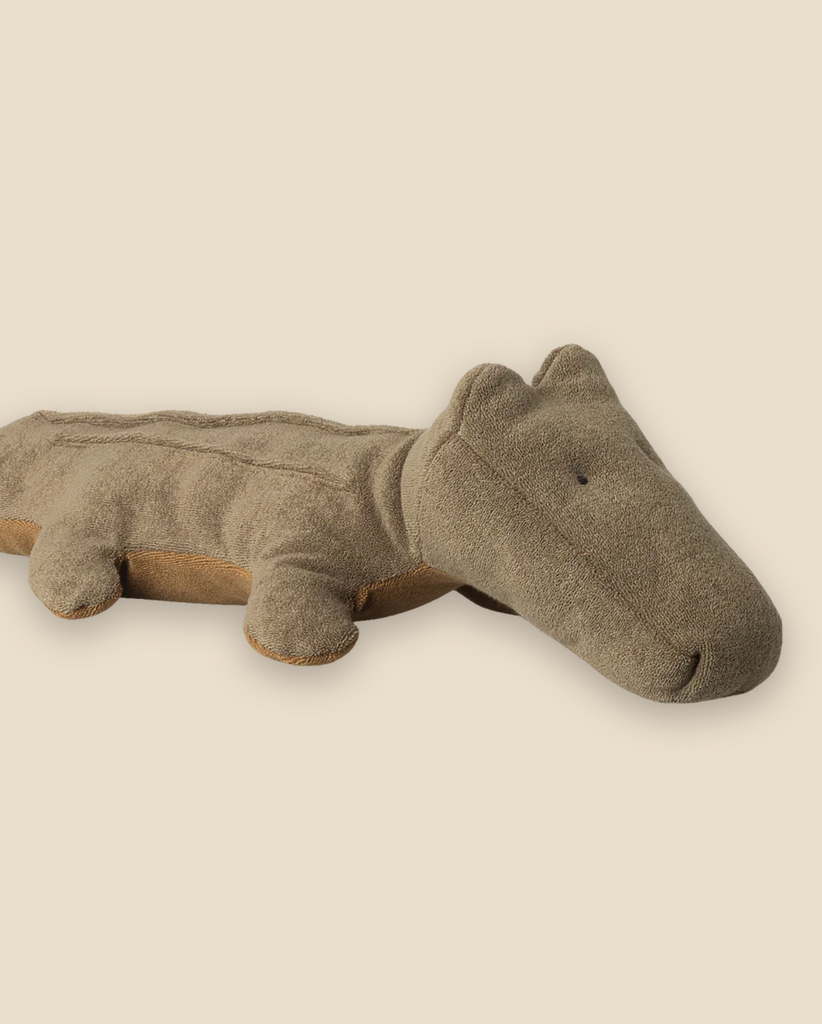 The Pre-order: Maileg Crocodile, Medium - Olive Green (Expected arrival by: 06/15/26) plush toy features soft material, stitched details, and simple black eyes—perfect for cuddles on a light beige background.