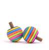 The Mader Turn-Over Top - Striped includes two maple wood spinning tops with blue, yellow, pink, green, and orange stripes, shown against a plain white background.