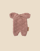The Maileg Extra Clothing: Knitted Suit, Micro - Heather for Micro Bunny is a small pink romper with short sleeves and legs, shown laid flat on a plain beige background.
