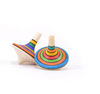 Two Mader Rallye Striped Spinning Tops (Small) made of beech wood, each with vibrant blue, green, orange, yellow, and black rings, are shown on a white background—one upright and the other lying on its side.