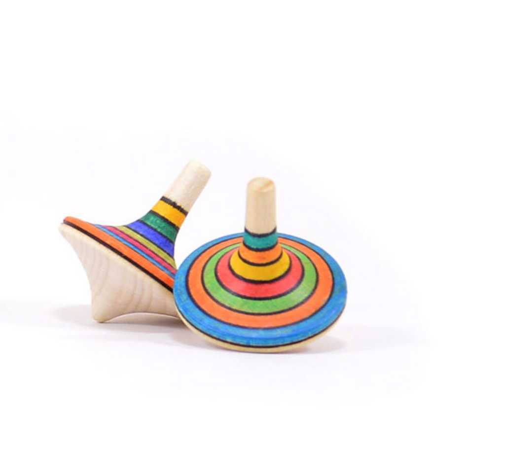 Two Mader Rallye Striped Spinning Tops (Small) made of beech wood, each with vibrant blue, green, orange, yellow, and black rings, are shown on a white background—one upright and the other lying on its side.