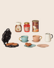 The PRE-ORDER: Maileg Waffle Set, Mouse (Estimated Arrival Mid October) includes a wafflemaker play set with waffles, cups, saucers, three labeled jars, a white pitcher, and pink plate—perfect pretend breakfast accessories.
