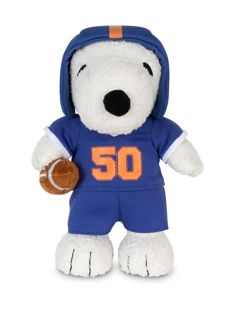 The Peanuts Snoopy - American Football plush showcases Snoopy in a blue football uniform with the number 50, matching helmet, and a brown football—a cute collectible for fans by Bon Ton Toys.