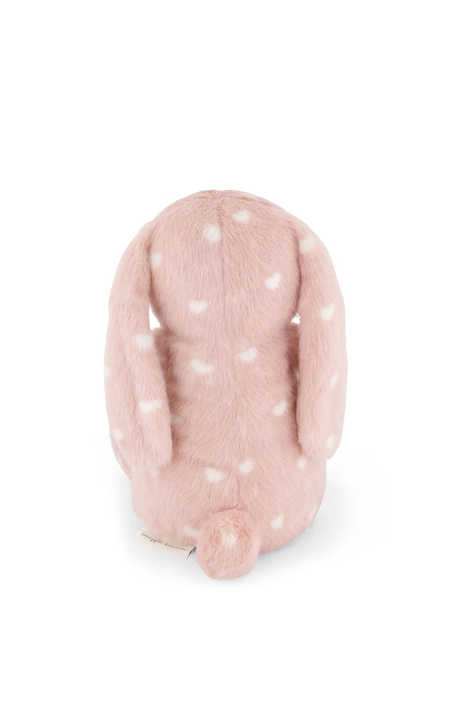 Snuggle Bunnies - Penelope - Little Love is a blush pink bunny soft toy with white spots, long floppy ears, and a small round tail, shown from behind on a white background—making it a charming keepsake gift.