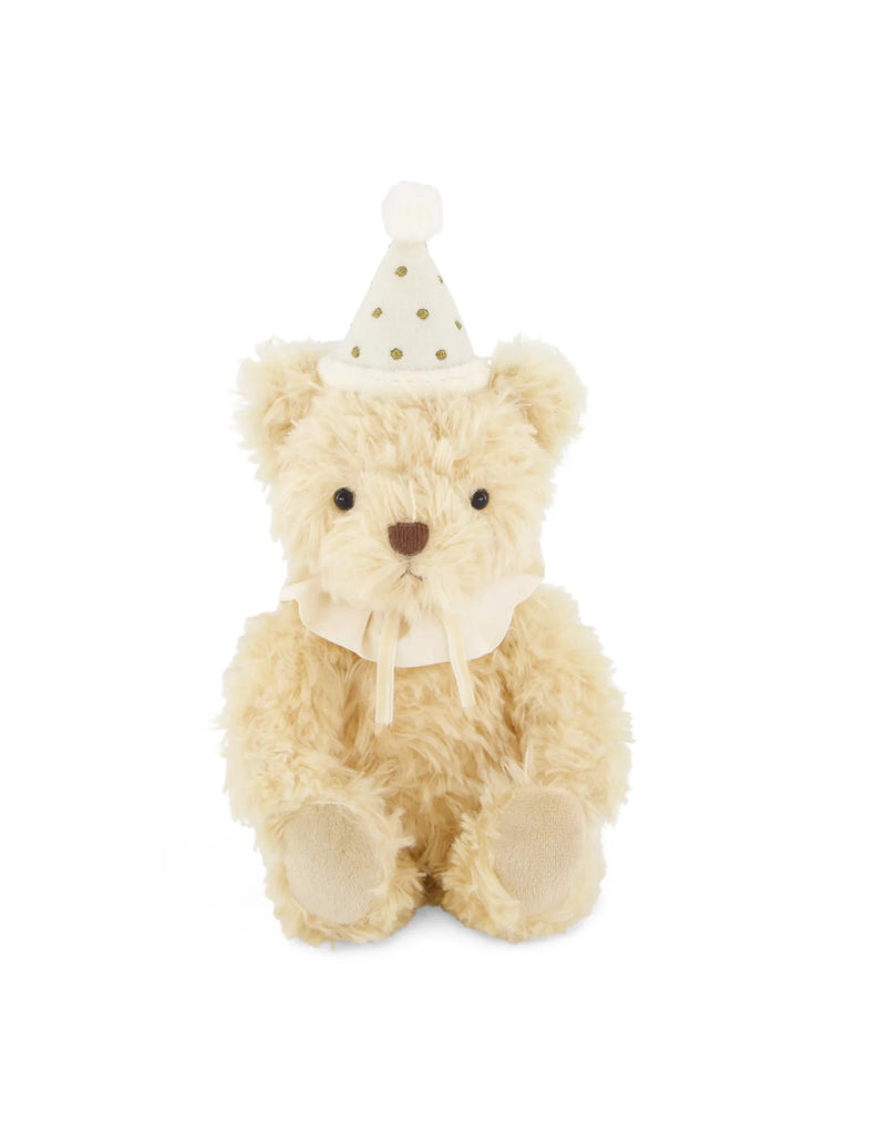 Snuggle Bunnies - Birthday Arthur - Ivory is an ultra-soft, cream-colored plush teddy bear wearing a party hat with gold polka dots and a ruffled collar.