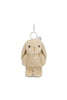 The Snuggle Bunnies - Penelope Keyring - Caramel is a beige soft bunny bag charm with floppy ears, black button eyes, a heart-shaped chest charm, and a silver keyring clasp—perfect for adding cuteness to any bag.