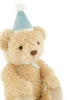 Snuggle Bunnies - Birthday Arthur - Sky is a fluffy light brown bear plush with a blue party hat, white pom-pom, and light blue ribbon—an adorable keepsake gift, pictured sitting upright against a white background.