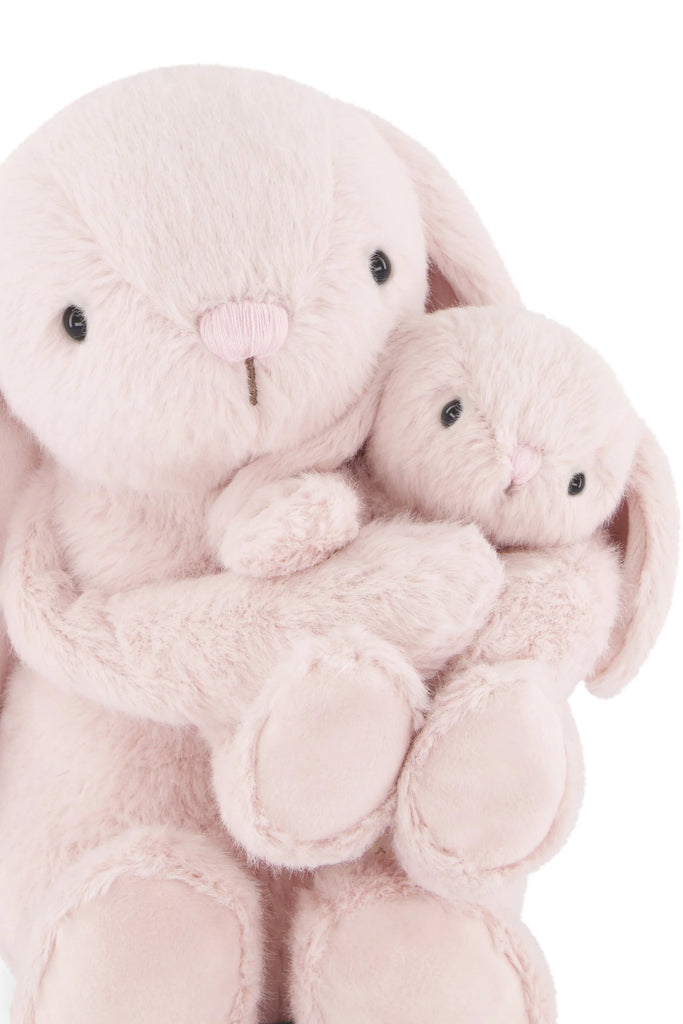 Snuggle Bunnies - Frankie the Hugging Bunny - Blossom features two light pink bunnies—a mama and baby—cuddling together with floppy ears, round black eyes, and soft plush fur for a cute, comforting scene.
