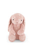 Snuggle Bunnies - Penelope - Little Love is a blush pink bunny soft toy with white spots, long floppy ears, black button eyes, and a small embroidered heart on one paw. Sitting facing forward against a white background, it makes the perfect keepsake gift.