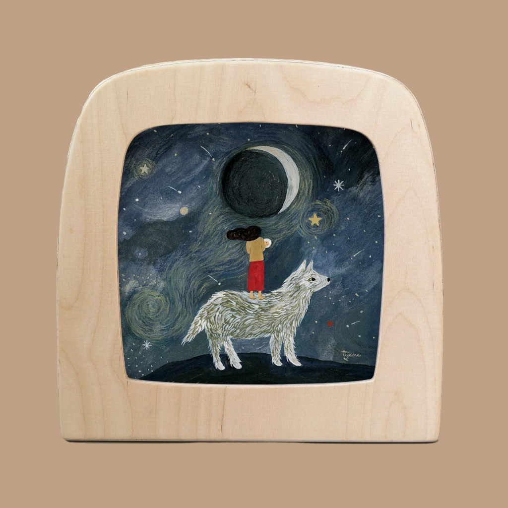 The Silhouette Only - Mother Wolf for Toverlux Lamp features a girl on a white wolf reaching for a crescent moon under starry skies, with swirling patterns and magical silhouettes creating an enchanting atmosphere.