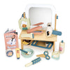 A child's Hair Salon set with a mirror, hair salon tools, beauty products, and accessories, all spread out on a white surface.