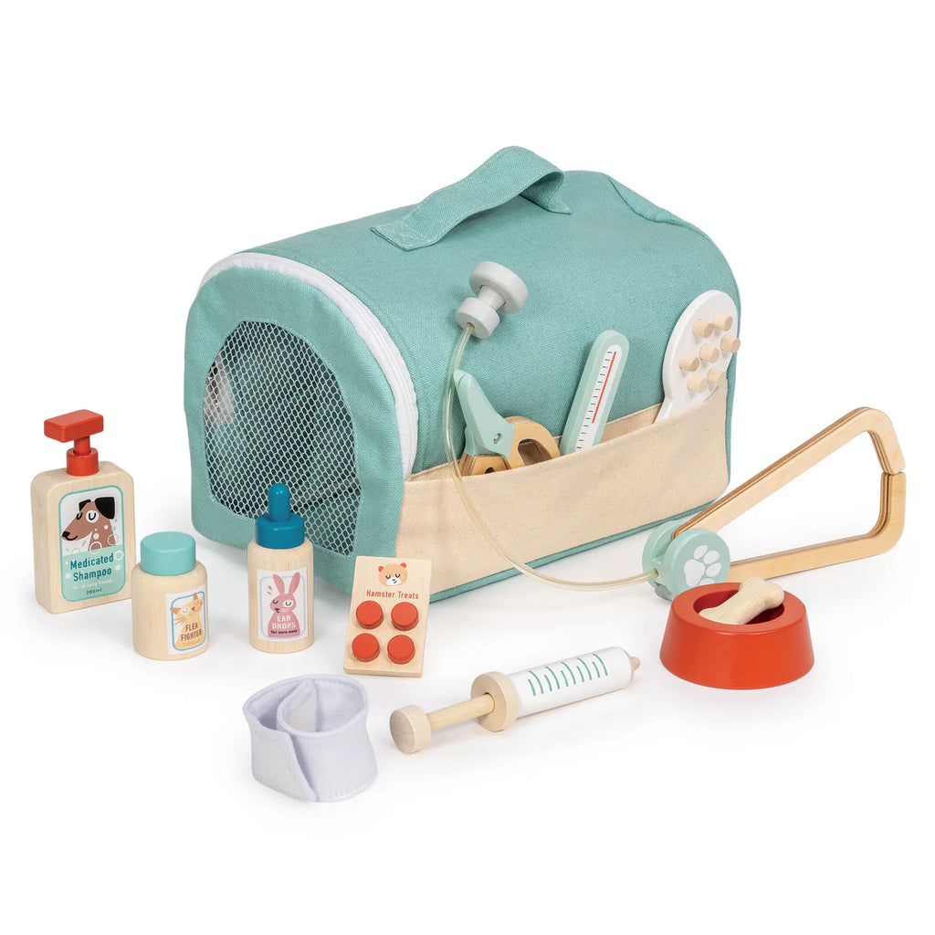 Introducing the Animal Rescue Vet Case—a charming veterinary play set that features a teal pet vet bag, which also serves as a pet carrier toy. The set comes with a toy stethoscope, syringe, medicine bottles, bandage, thermometer, pills, feeding bowl, and brush—all neatly displayed in front of the bag to inspire endless imaginative play.