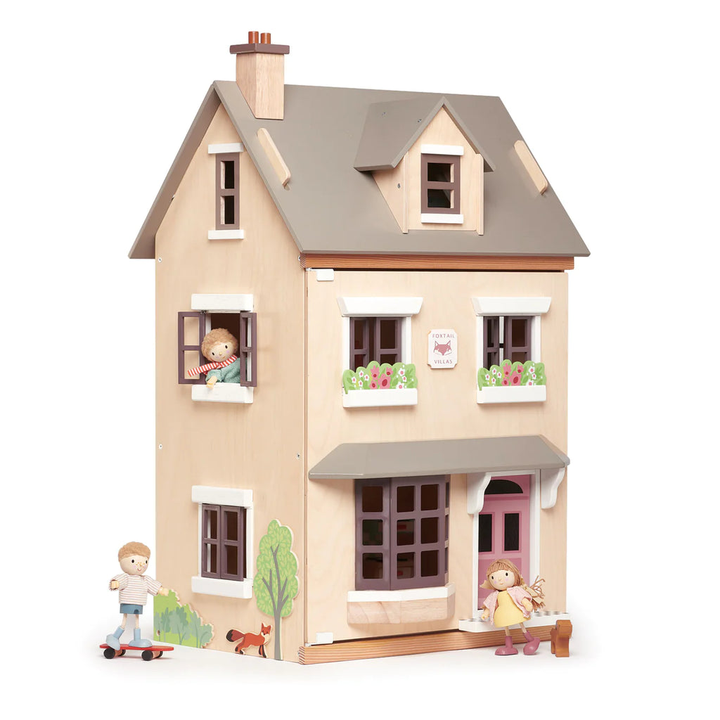 Illustration of a three-story Foxtail Villa Dollhouse, with detailed interior, featuring children playing outside, one with a skateboard and one with a bucket.