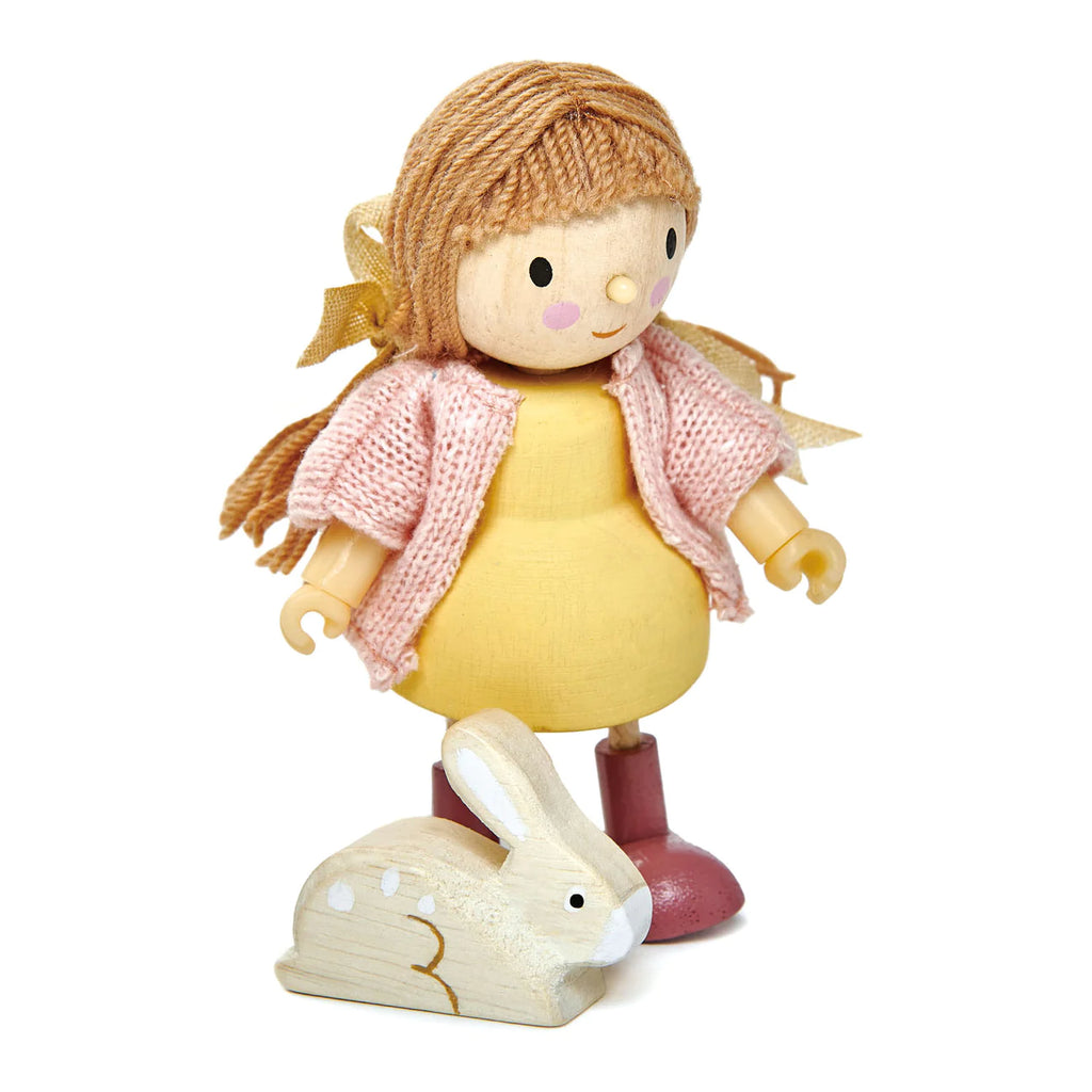 A wooden doll with brown yarn hair and a yellow dress stands next to Amy and her Rabbit, all set against a white background.