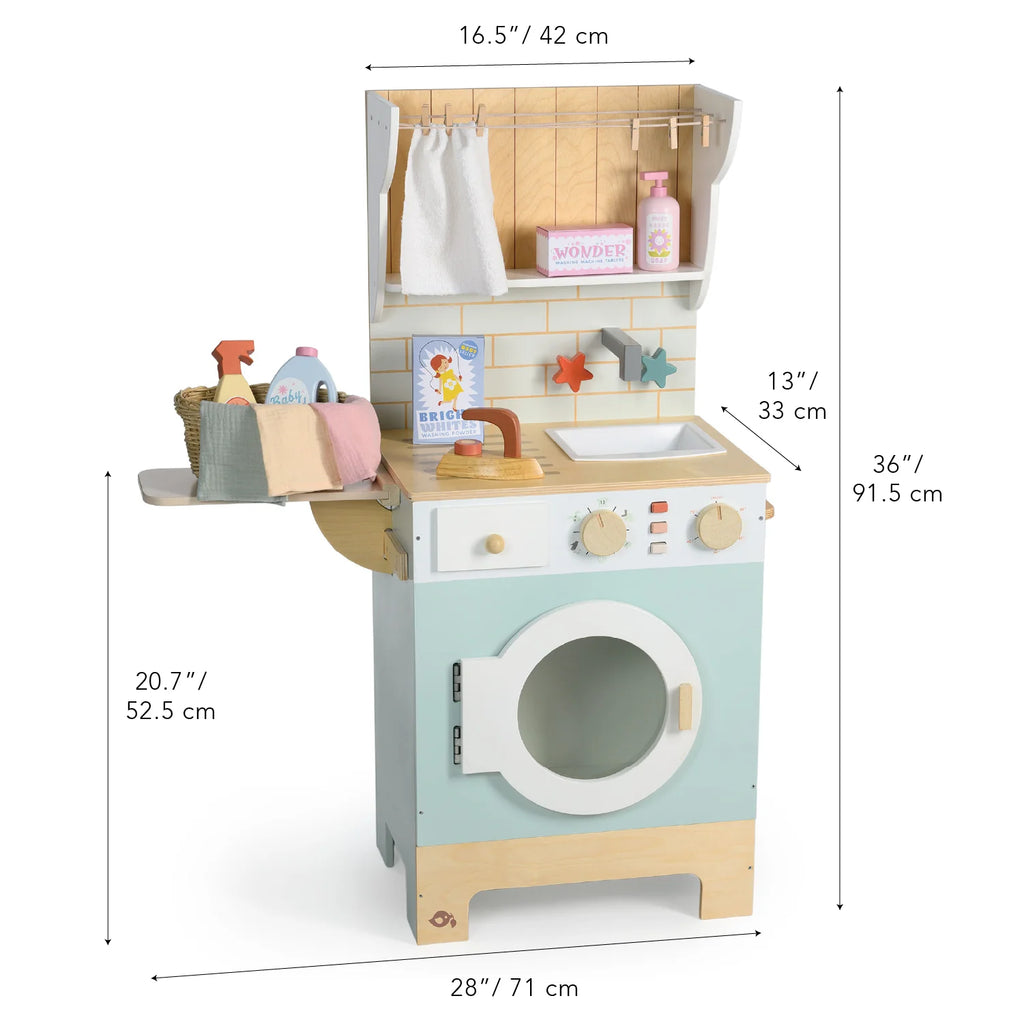 The Wooden Laundrette is a sturdy children’s wooden play laundry set with a washing machine, sink, shelf, cleaning supplies, and accessories—perfect for imaginative pretend play. This toy features clearly labeled item dimensions: 36"/91.5cm high, 16.5"/42cm wide, and 28"/71cm long.