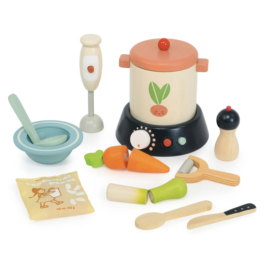The Stir and Serve Soup Maker is a colorful wooden playset with a pot, lid, bowl, utensils, hand blender, pepper grinder, veggies, and flour packet—everything little chefs need for pretend soup-making fun!.