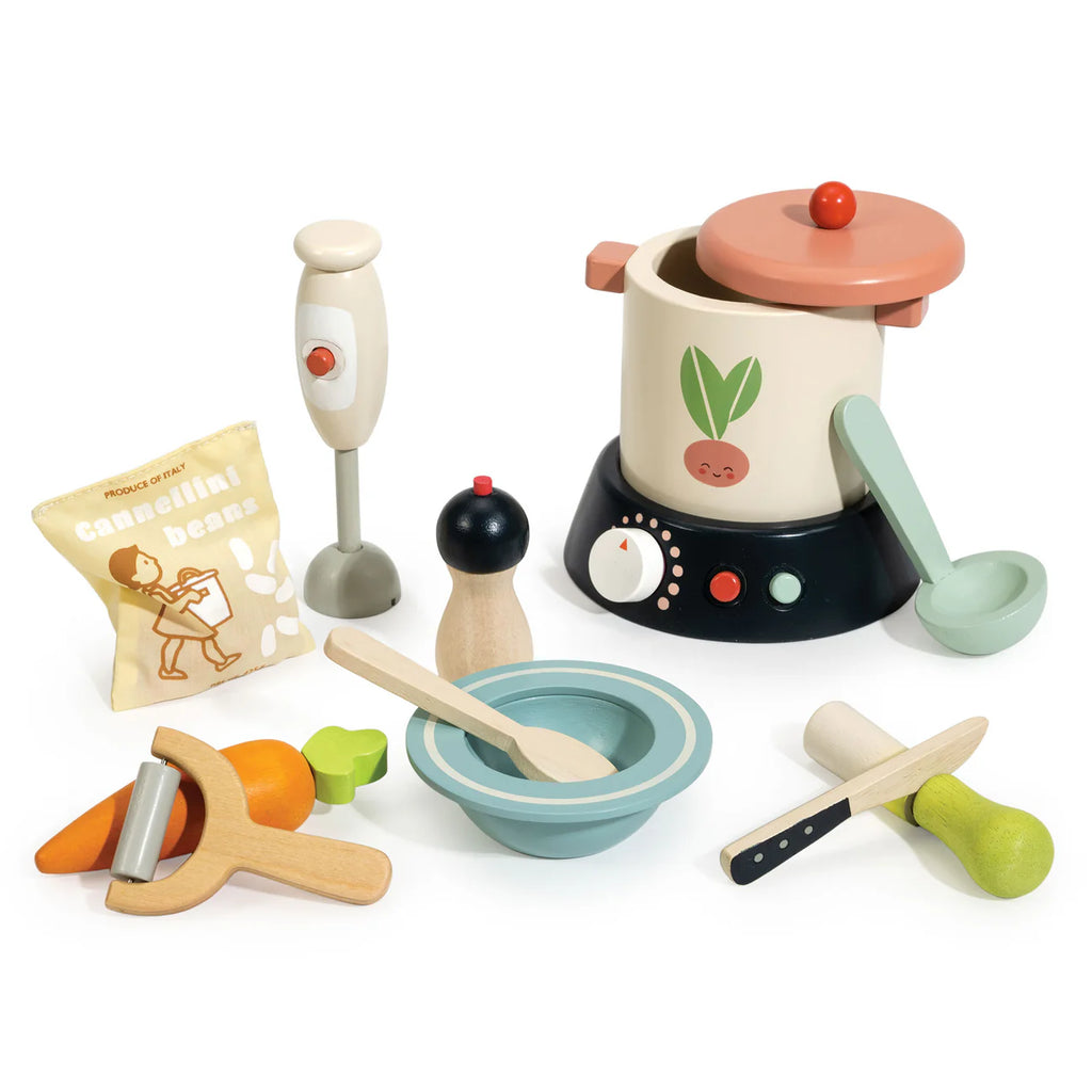 The Stir and Serve Soup Maker is a colorful kids’ kitchen set with a pot, lid, hand mixer, pepper grinder, bowl, utensils, play veggies, and a "cannellini beans" bag—everything for creative pretend soup-making fun.