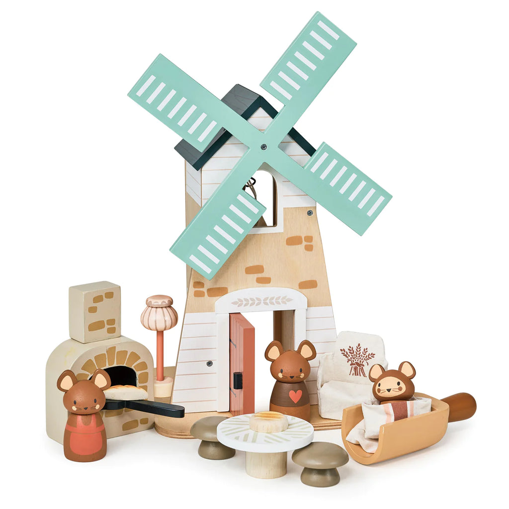 A Penny Windmill toy set designed for imaginative play, featuring a windmill, two bear figures, a couch, a lamp, a small house, a bed, a bench, and accessories.